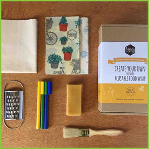 A make your own beeswax wrap kit from Honeywrap - includes wax, grater, plain organic cotton sheets, a brush and pens.