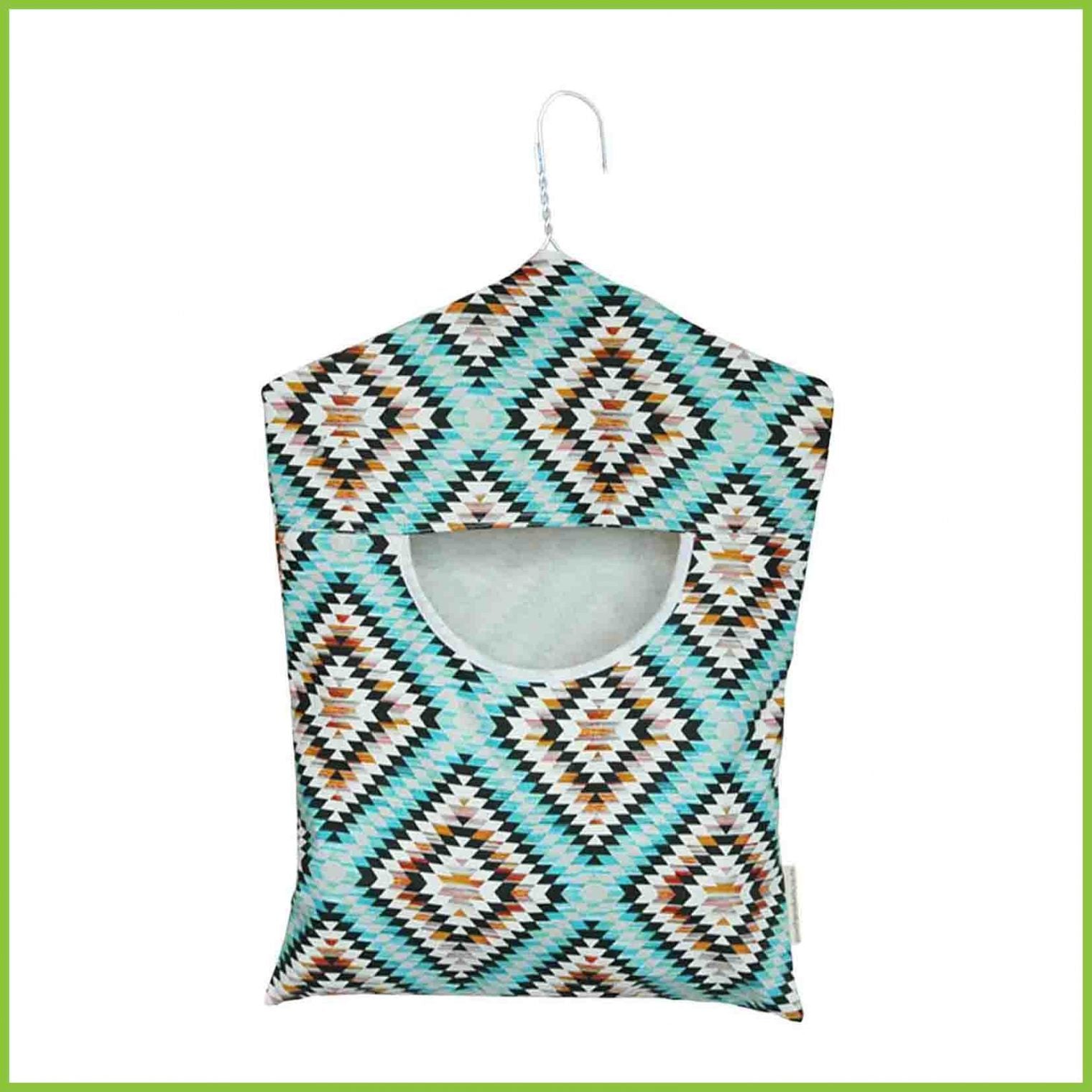 A cotton peg bag with an abstract aztec design in blue and grey.