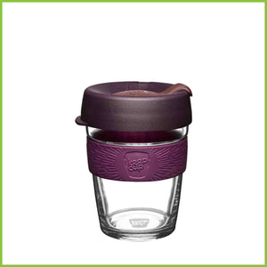 A medium KeepCup made from glass with a deep purple lid and band..