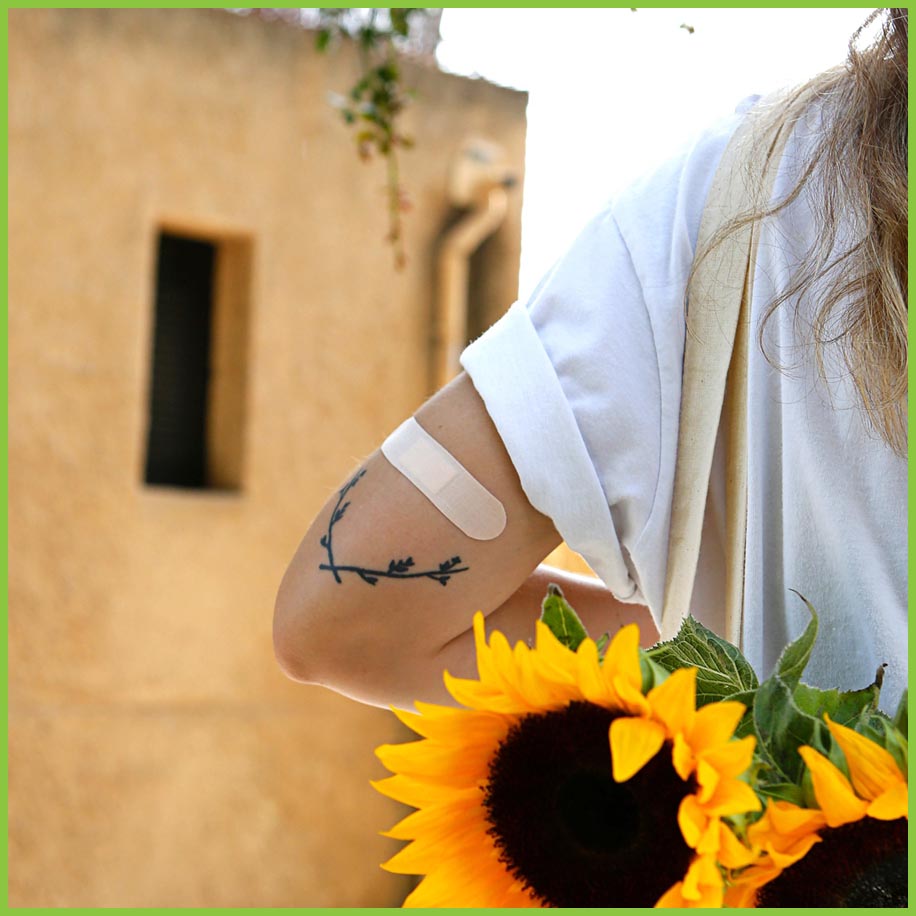 A photo showing a lady with Patch bamboo plaster on her arm.