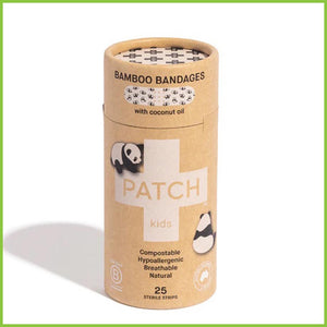 A cardboard tube of bamboo plasters with coconut oil. These plasters are white with a cute panda print.