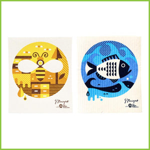 Two Swedish patented dish cloths. One with an abstract yellow honey bee design and the other with an abstract blue snapper design.