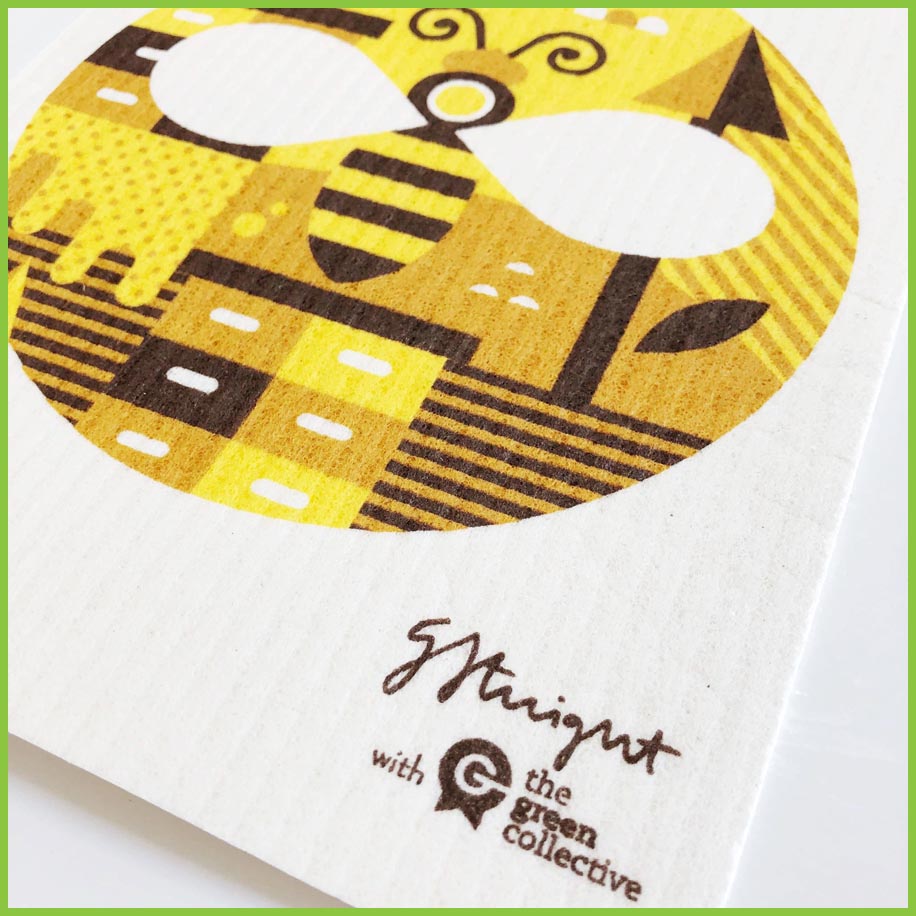 A close up image of the Spruce Swedish dish cloth with the bee design.