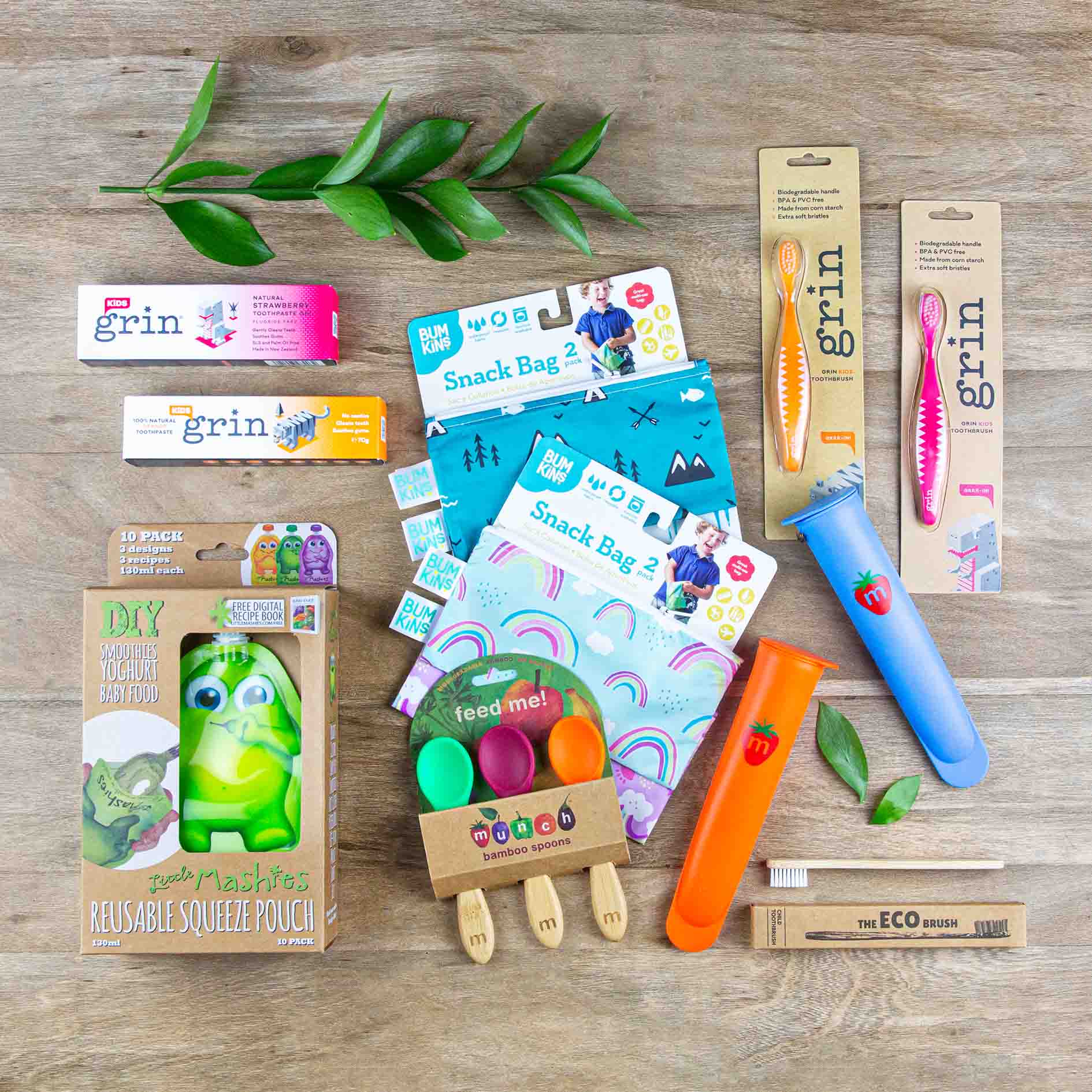 A range of eco products for kids and babies, including ice pop pouches, reusable food pouches, bamboo spoons, snack bags and bamboo toothbrushes and toothpastes.