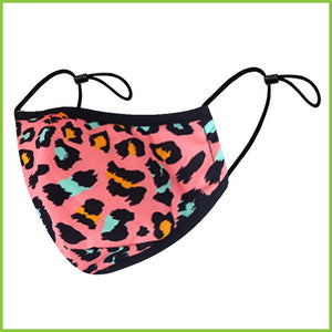 A reusable face mask with a pink, blue and orange animal print.