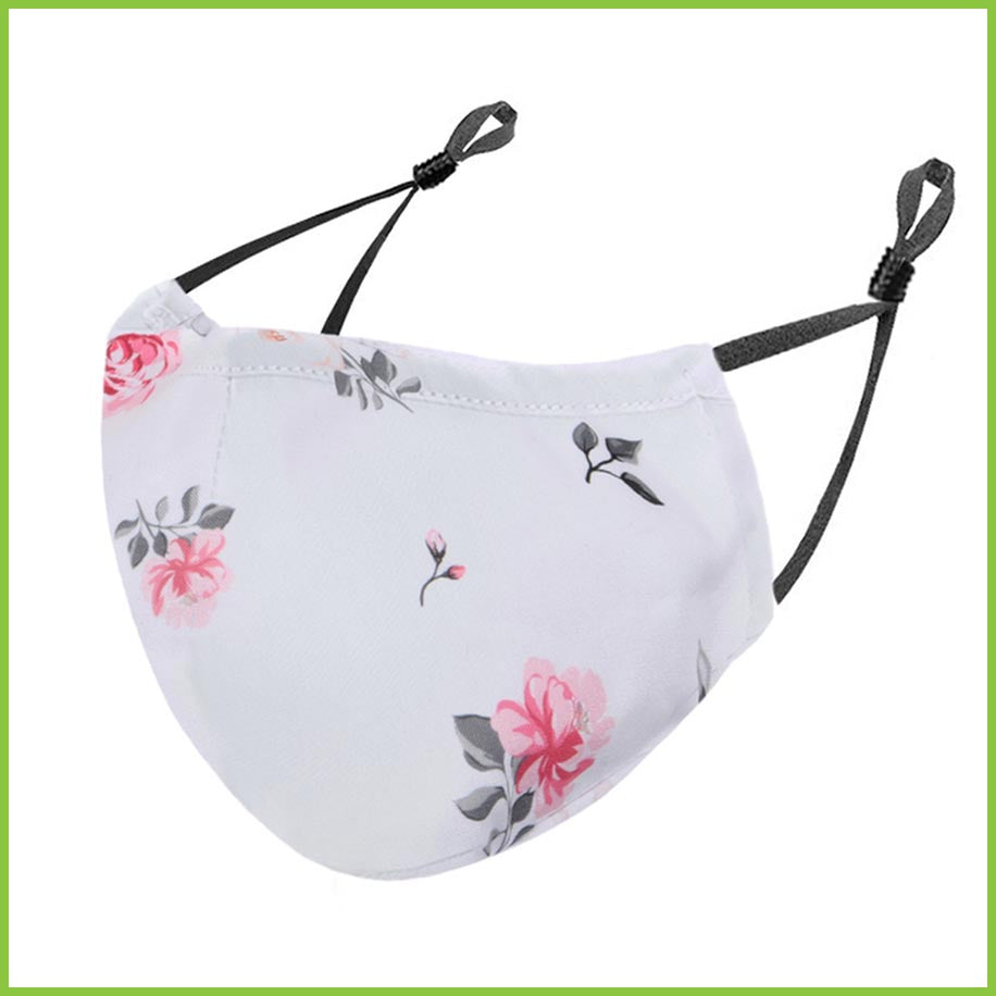 A reusable face mask with a pretty white floral print.