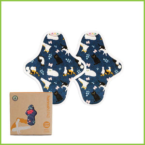 Two reusable sanitary pads in the small size from Hannah. This pack includes two organic cotton pads with a dark blue and cat design on the outer layer known as 'Cute Cats'.