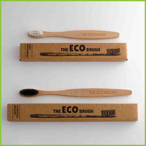 Kids bamboo toothbrush and an adults bamboo toothbrush.