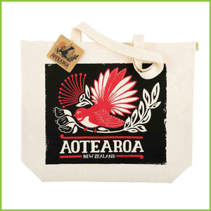 A strong reusable shopping bag made from organic cotton with a red and black design of a fantail and Aotearoa text.