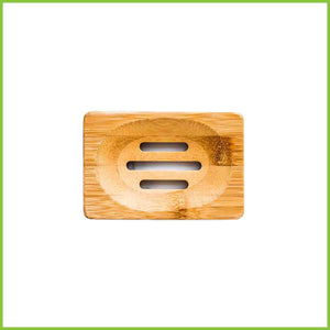A wooden soap dish made from bamboo.
