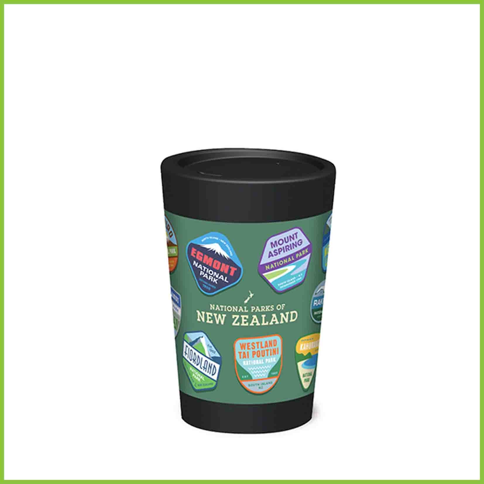 A reusable cup with a range of New Zealand National park badges. 