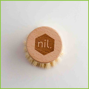 Wooden dish brush head from Nil.