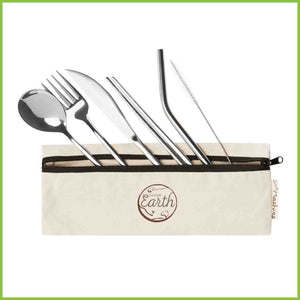 A silver spoon, fork, knife, set of chopsticks, straw and a straw cleaner, laying half in and half out of a travel cotton case with a zip.